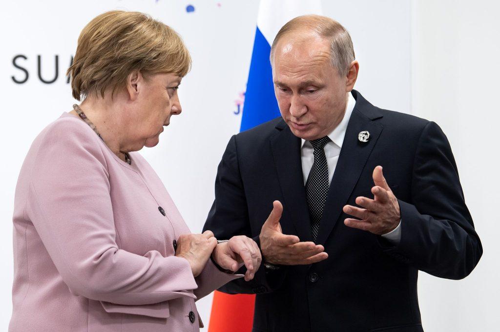 Angela Merkel i Vladimir Putin/ Foto: Bernd von Jutrczenka/dpa